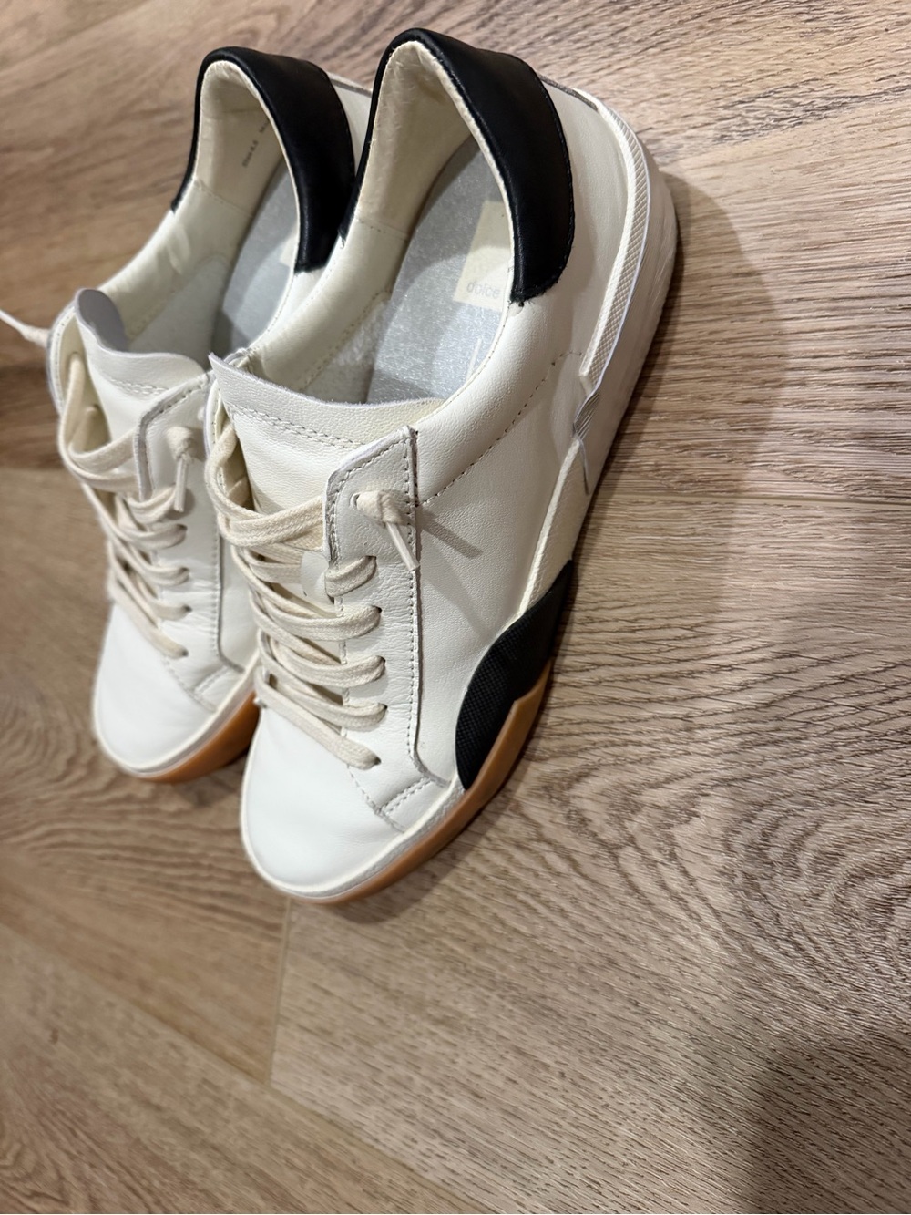 Dolce Vita Cream and Black Lace-Up Sneakers with Gum Sole
